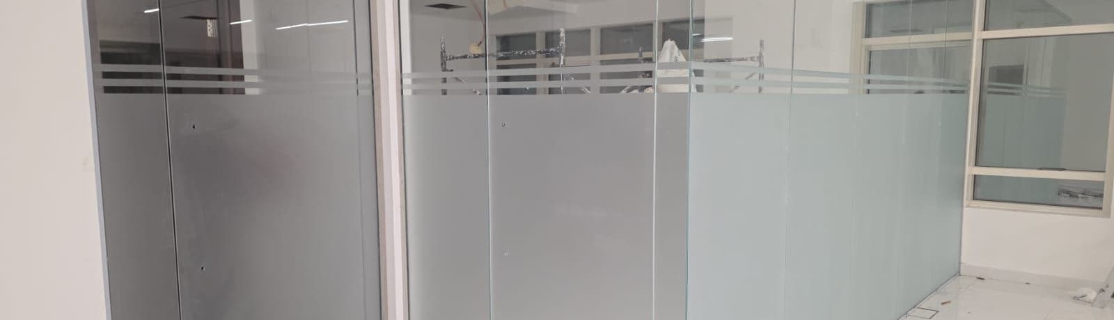 Frameless toughened glass shower enclosure installed by Pillarstone in the UAE